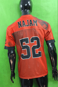 "Player wearing Best American Football Uniform 2025 in action on the field"

