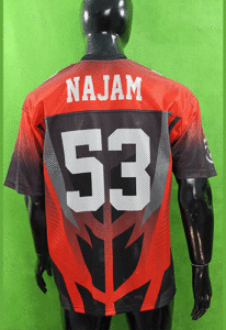 "Youth team in matching American football uniforms posing before the game"

